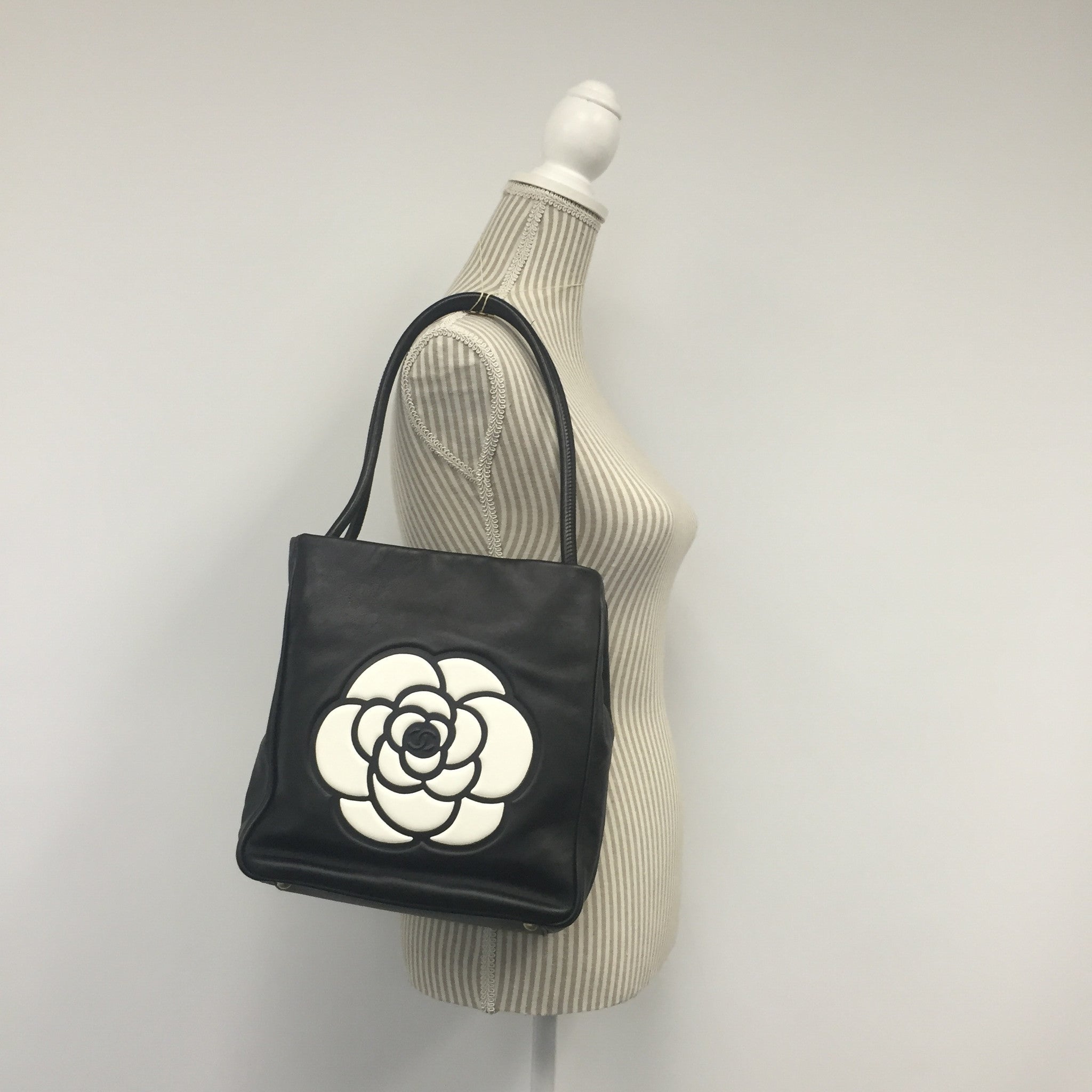 Chanel Black Leather Handbag with Camellia