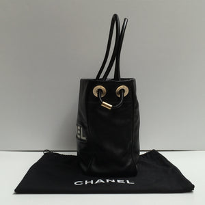 Chanel Black Leather Handbag with Camellia